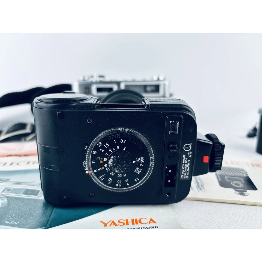 Yashica Vintage Electro 35 GSN Camera & Minolta Electroflash 28 & Film & Books